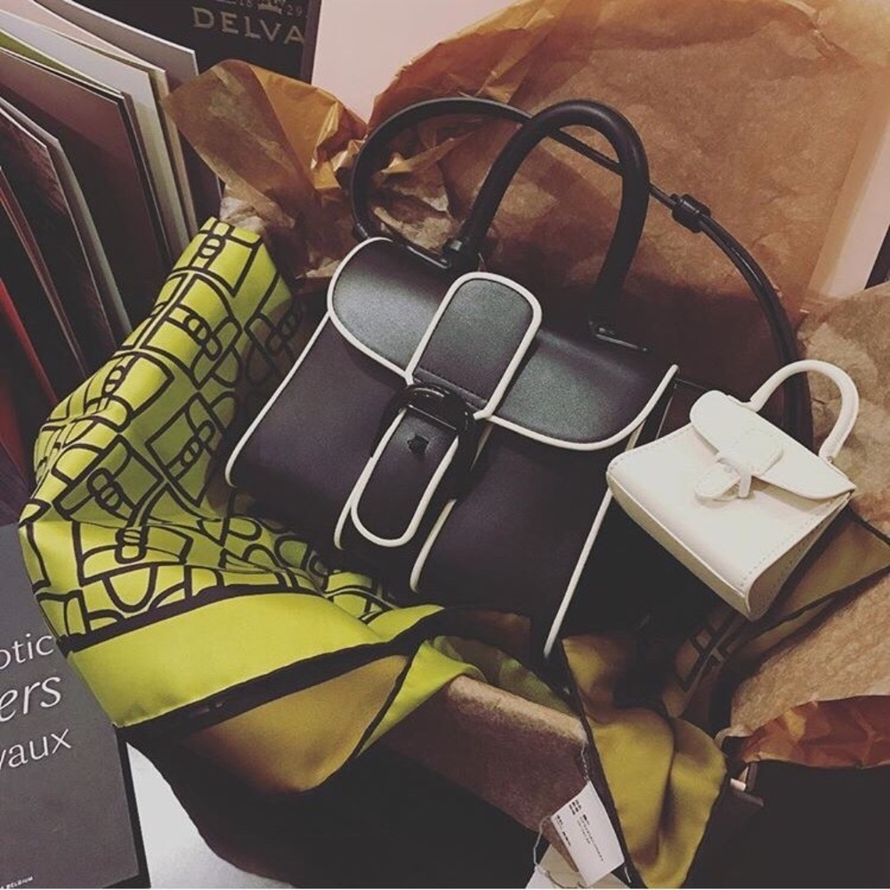 Brilliant box calf skin mini bag.